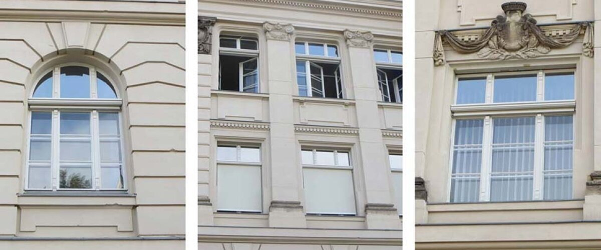 Stilvolle Außenterrasse mit Lamellendach und Beleuchtung Denkmalgeschützte Fassade mit speziellen Fenstermarkisen von Solarmatic.